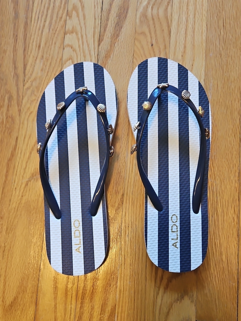 ALDO Navy and White Striped Flip Flops with Gold Shell Accents